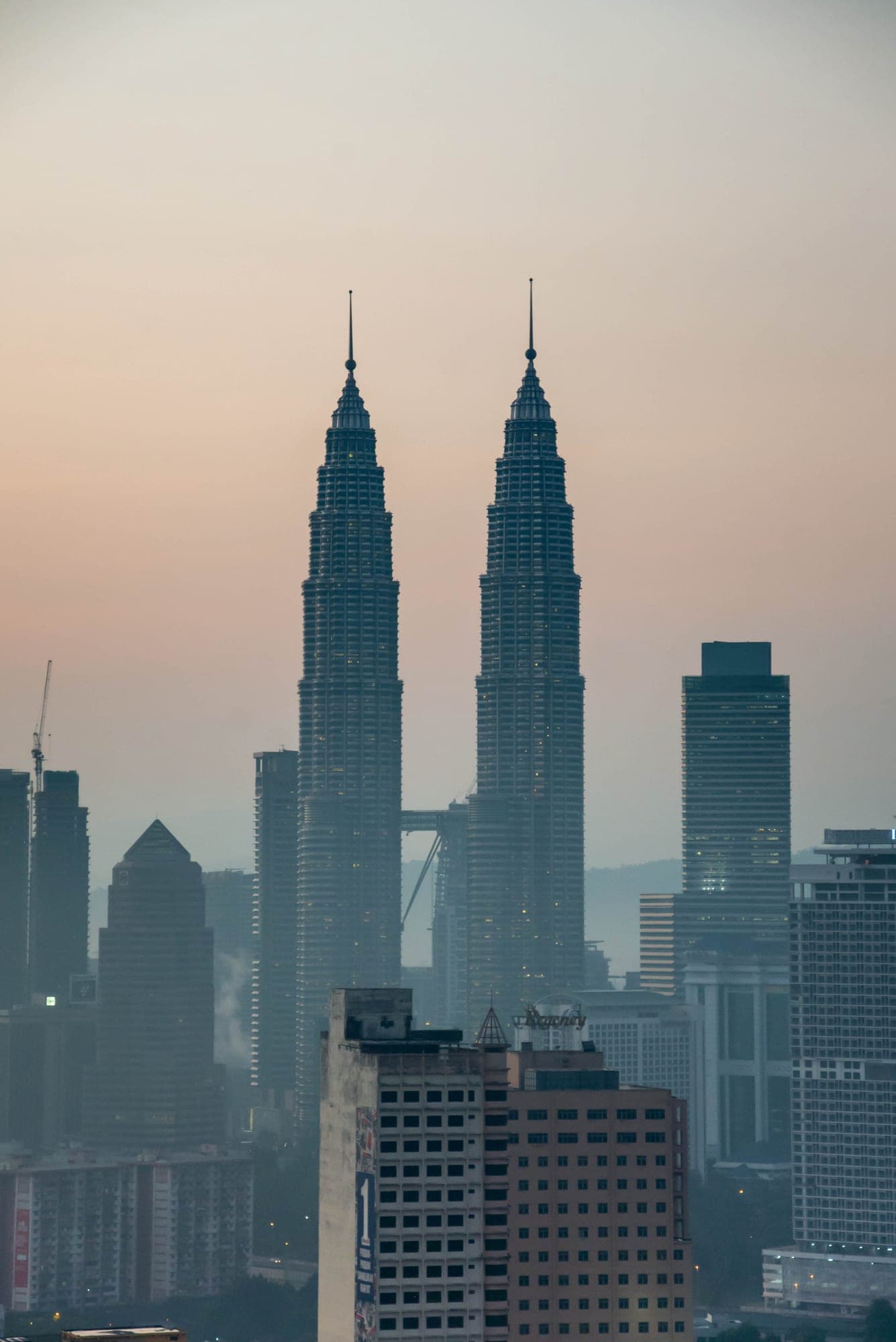 Kuala Lumpur skyline with the Petronas Twin Towers at sunset